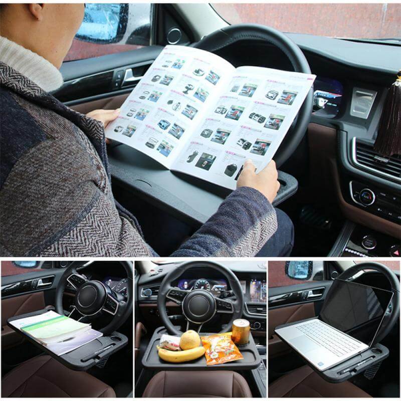 Person using a portable car steering wheel tray for reading and working in a car.