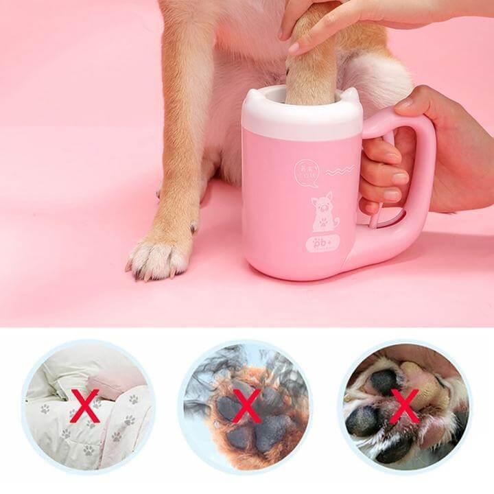 Portable dog paw cleaner being used to clean a dog's paws, preventing dirt and mud in the home.