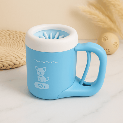 Portable dog paw cleaner with soft silicone bristles in a blue cup design for easy cleaning.