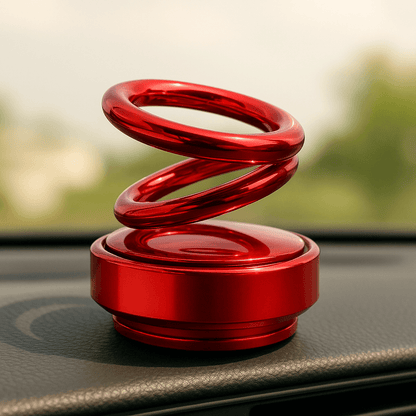 Auto Rotation Car Air Freshener – Double Ring in red displaying a stylish and modern design on a car dashboard.