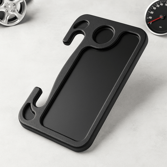 Portable car steering wheel tray resting on a surface with design features for ergonomic use while driving.