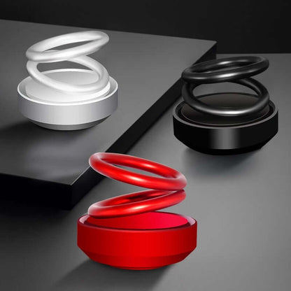 Auto Rotation Car Air Freshener – Double Ring in red, black, and silver with a stylish UFO design.