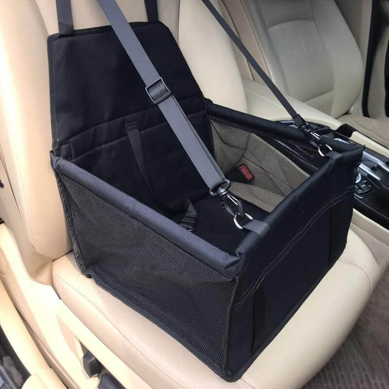 Dog travel car seat carrier designed for pet safety and comfort in the car.