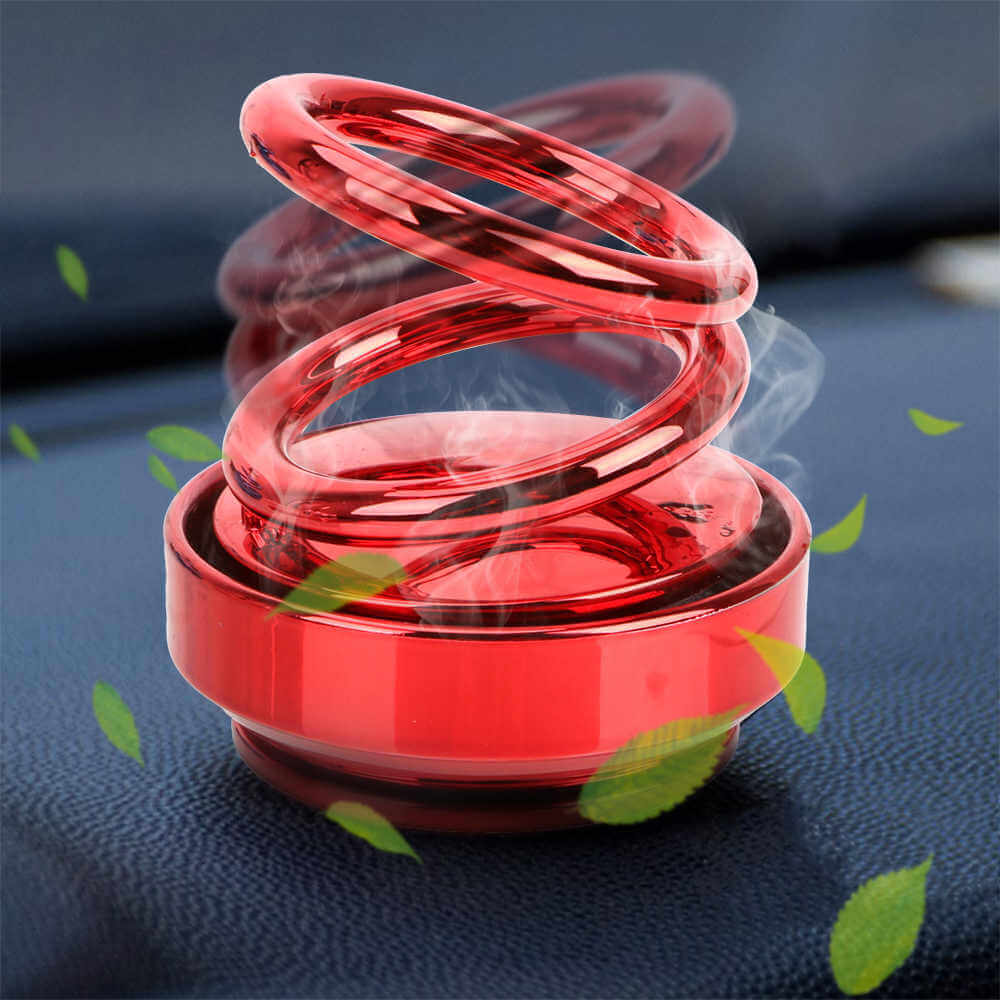 Auto Rotation Car Air Freshener – Double Ring design in red, releasing calming fragrance and enhancing car ambiance.