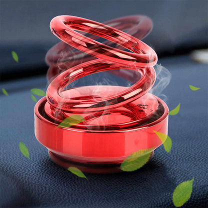 Auto Rotation Car Air Freshener – Double Ring design in red, releasing calming fragrance and enhancing car ambiance.