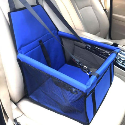 Dog travel car seat carrier in blue, designed for pet safety and comfort during car rides.