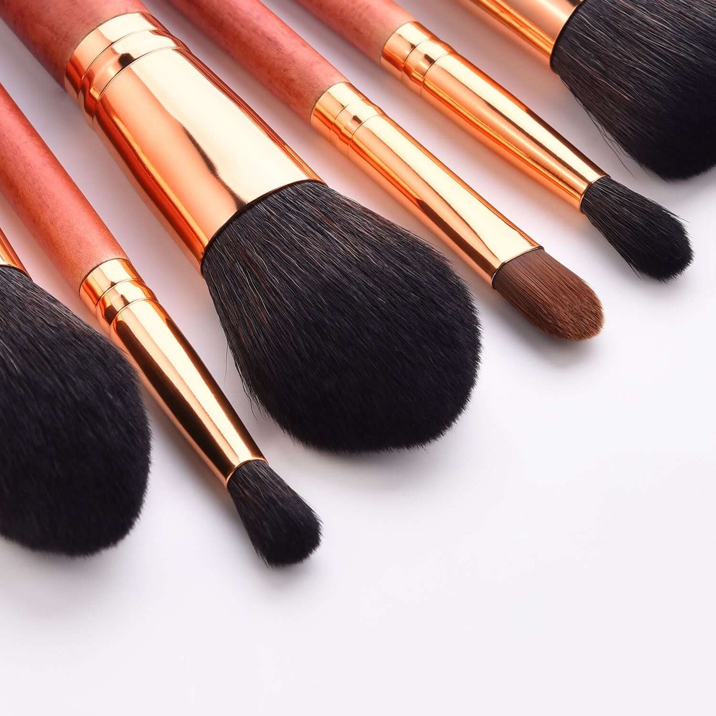 12-Piece Makeup Brush Set with Powder Brush and Wood Brushes featuring soft nylon bristles and wooden handles.