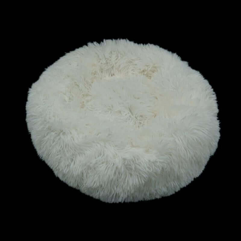 Calming donut bed for pets, ultra-soft, fluffy, and cozy round bed for dogs and cats.